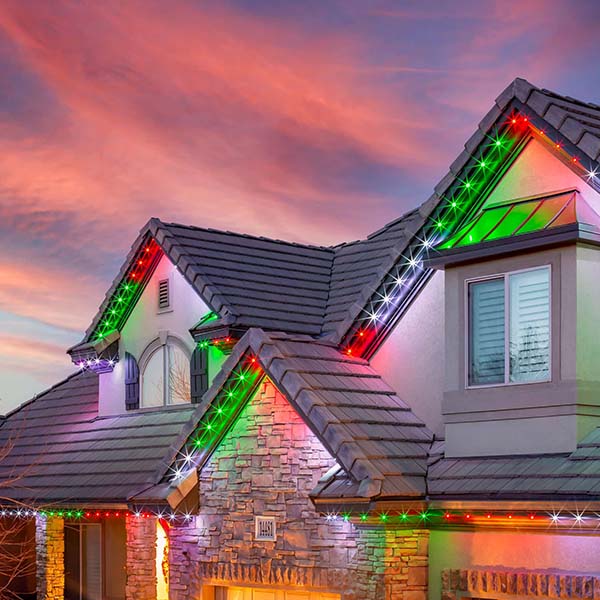 Decorative outdoor lights on roof of a house, THE NIGHT IN STYLE